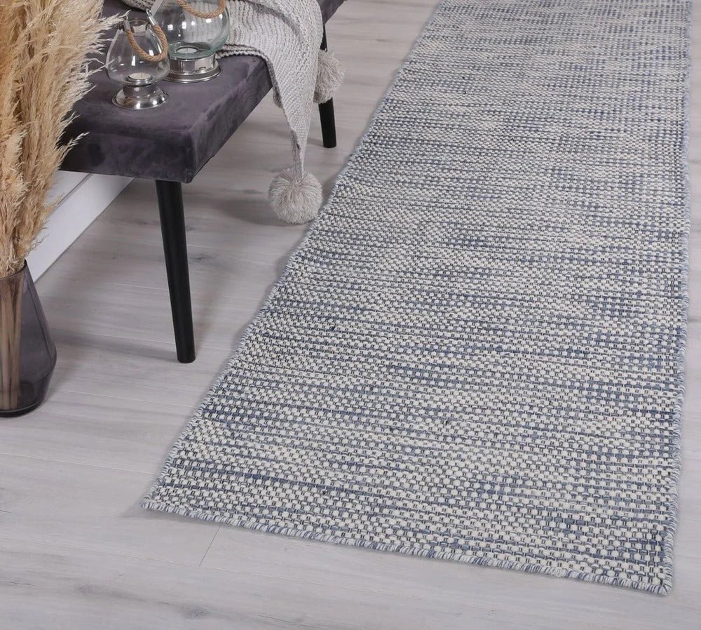 Can an Extra-Large Rug Make any Room Look Bigger?
