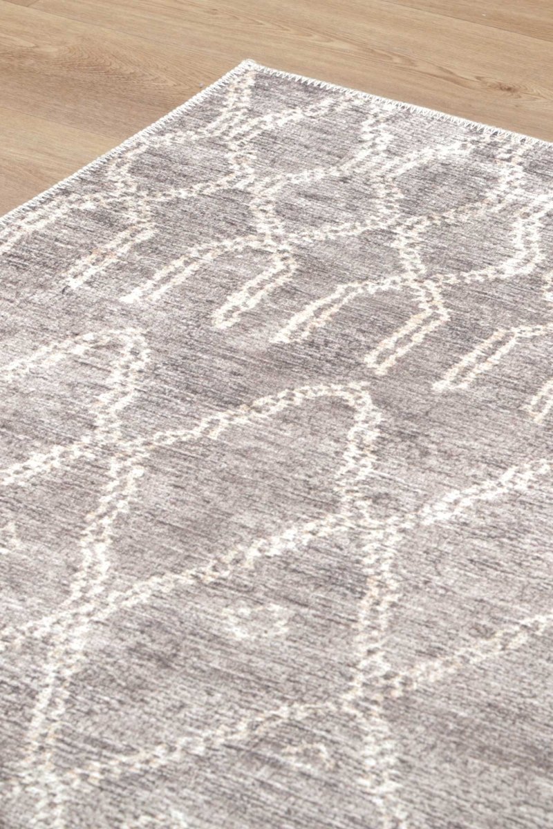 A close-up view of the Nahla Beige Rug's Fur_riendlyâ„¢ technology, which reduces allergens from pets and dust, making it a great choice for allergy sufferers.